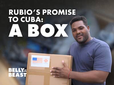 Belly of the Beast journalist Yohan Díaz holds a box of U.S. humanitarian aid to Cuba. Text reads: “Rubio’s Promise to Cuba: A Box.”