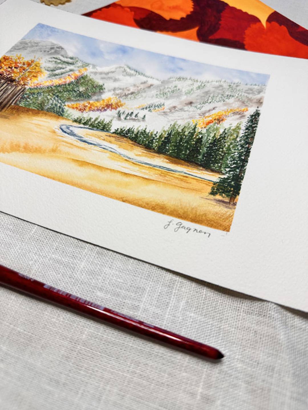 watercolor painting of an alpine meadow in fall