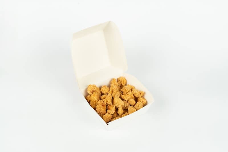 Small pieces of fried chicken in a box
