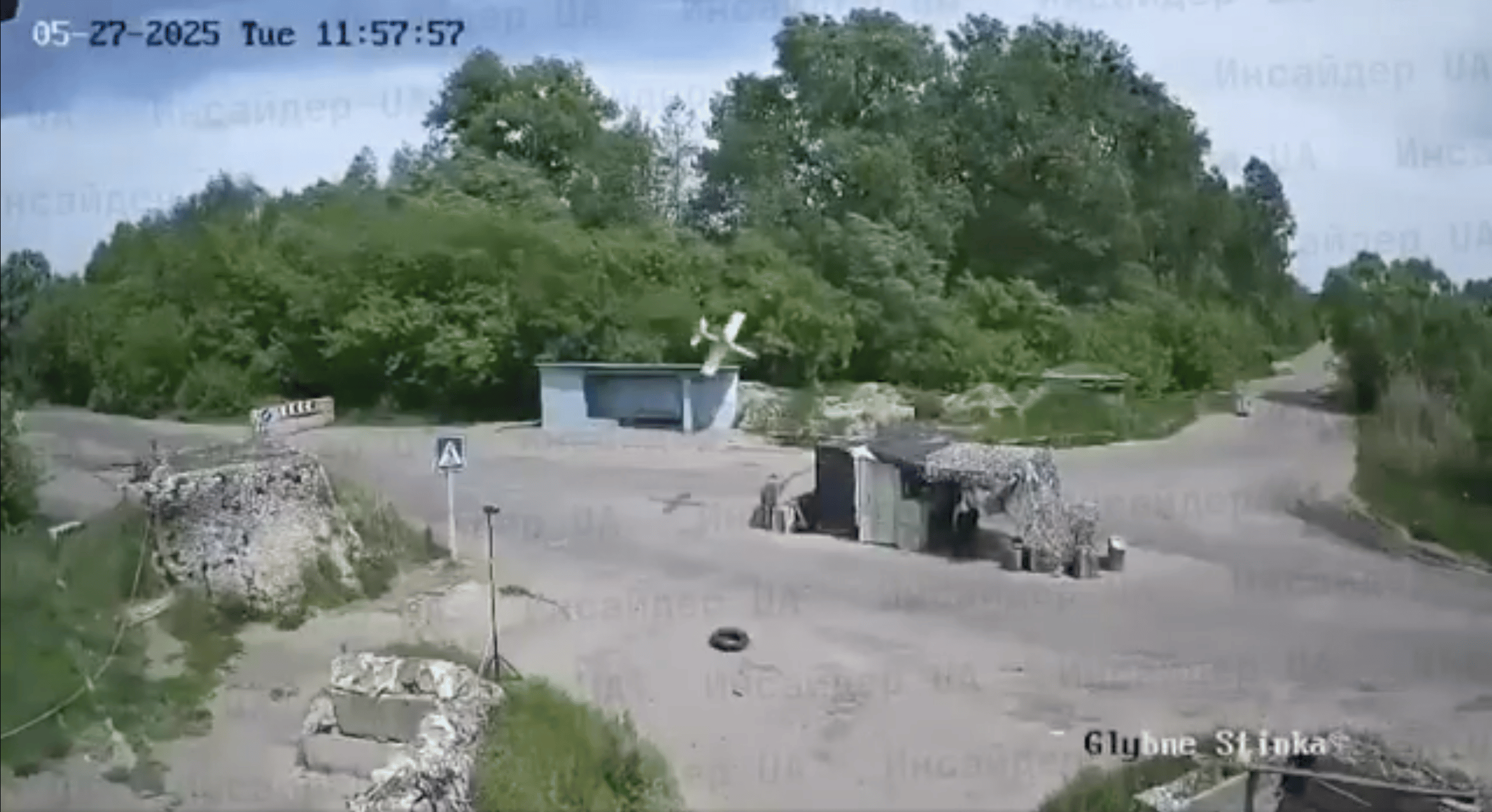 A screenshot from CCTV footage in the Sumy region shows the moment before a Russian ZALA Lancet explosive drone strikes a Ukrainian police checkpoint. (Photo via X) 