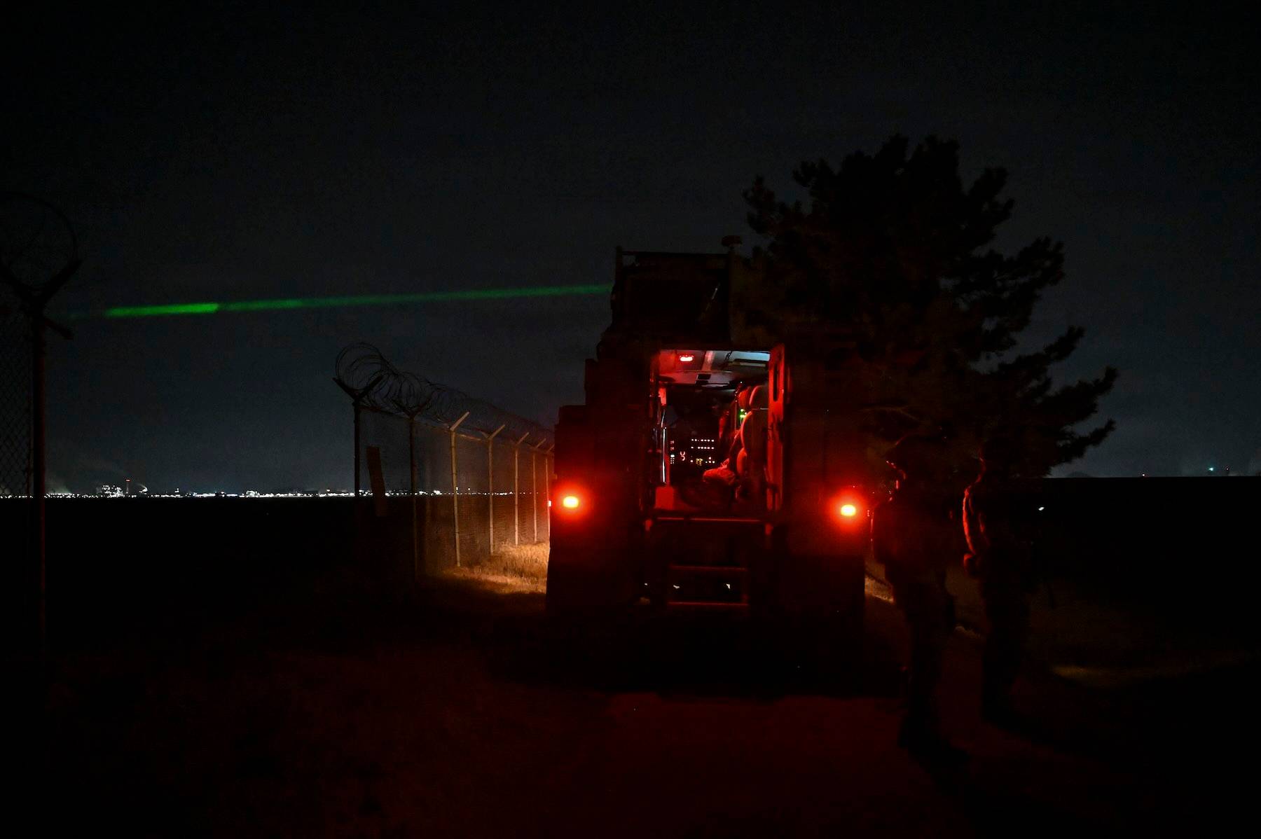 U.S. Air Force airmen aim a laser at a drone replica during Exercise Freedom Shield 26 at Kunsan Air Base, South Korea, on March 9, 2026. (Credit: U.S. Air Force photo by Staff Sgt. Karissa Dick)