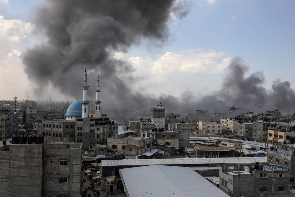 Smoke rises after Israeli air strikes near the border east of the city of Rafah in the southern Gaza Strip, on October 12 2023. (Anas-Mohammed / Shutterstock.com)