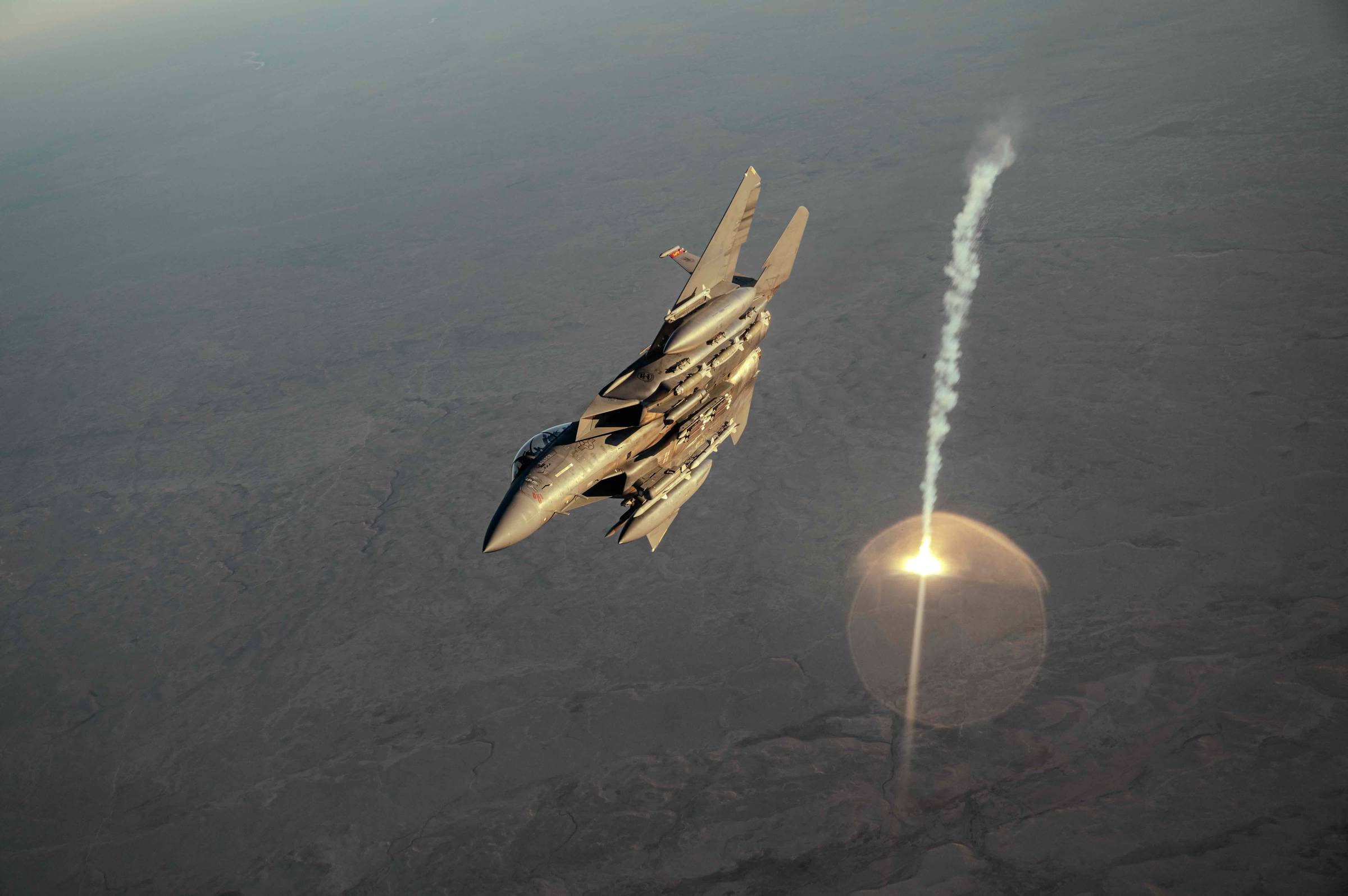 A U.S. Air Force F-15E Strike Eagle fires flares over the U.S. Central Command area of responsibility, Jan. 19, 2025.  (U.S. Air Force photo by Senior Airman Zachary Willis)