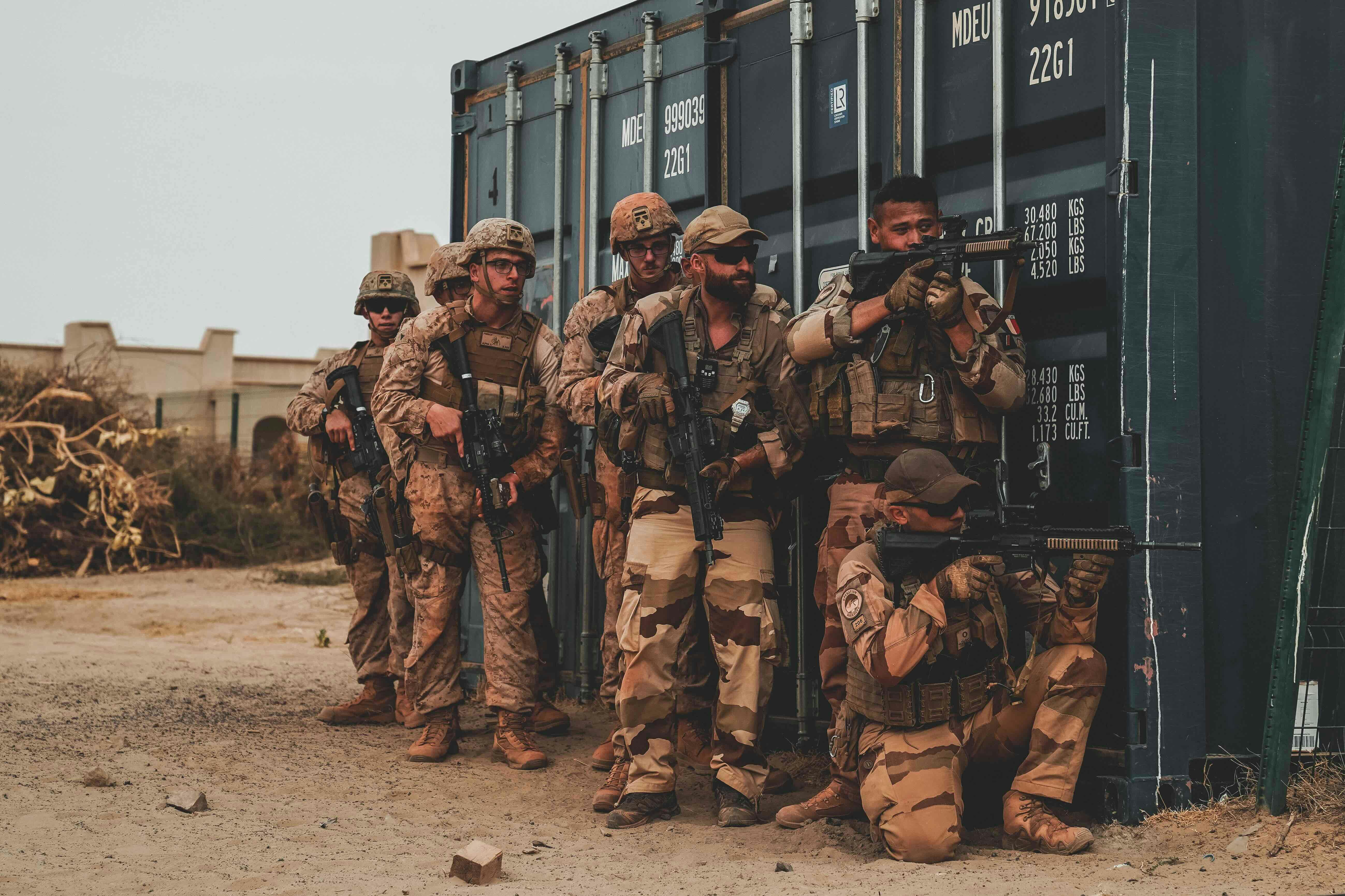 U.S. Marines with Fleet Anti-terrorism Security Company, Europe (FASTEUR), Commander, Task Force - 68 (CTF-68), and French armed forces soldiers conduct Military Operations in Urban Terrain (MOUT) training during a joint forces readiness exercise in Timbuktu, Mali