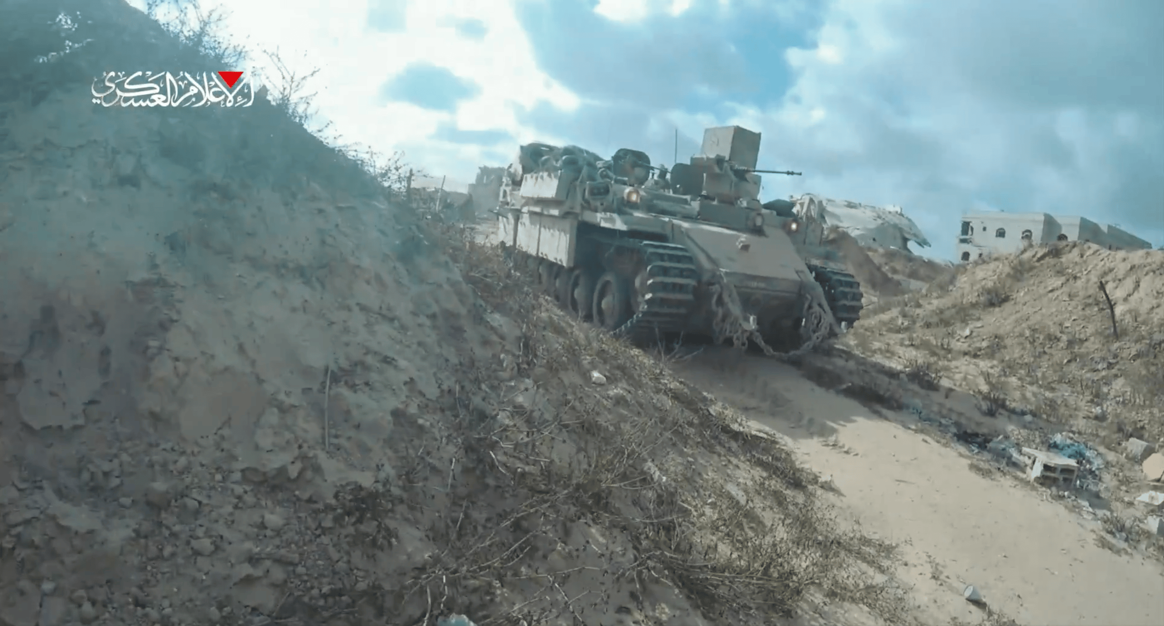 A screenshot from a video released by Hamas's Wassam Brigades showing its fighters ambushing Israeli forces (Source: Qassam Brigades via X)