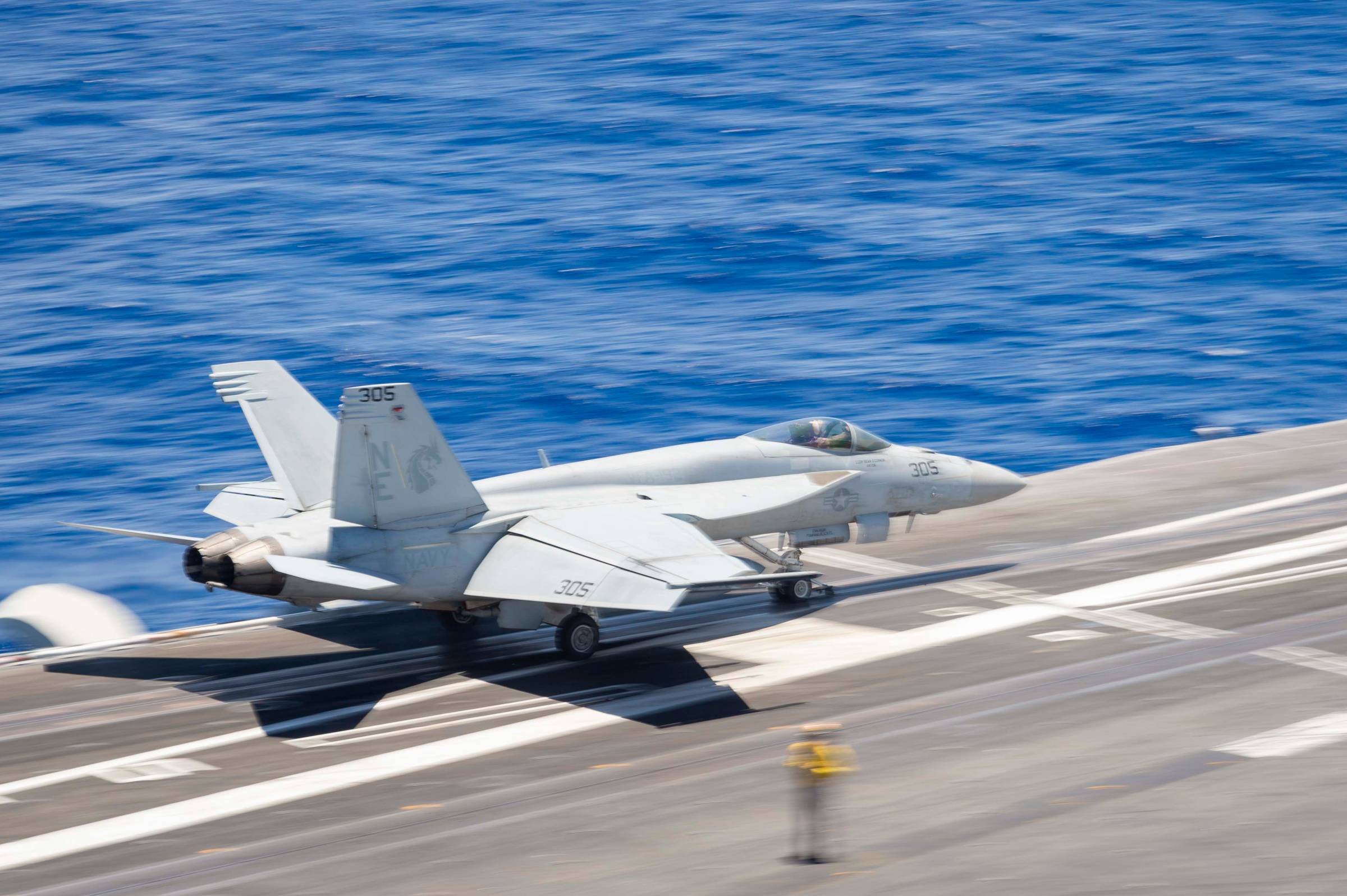  An F/A-18E Super Hornet launches off the flight deck of Nimitz-class aircraft carrier USS Carl Vinson (CVN 70).