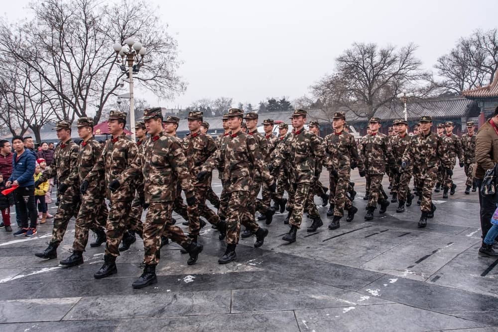 Chinese soldiers march in Beijing. (Jimmy Budiman Pictures / Shutterstock)