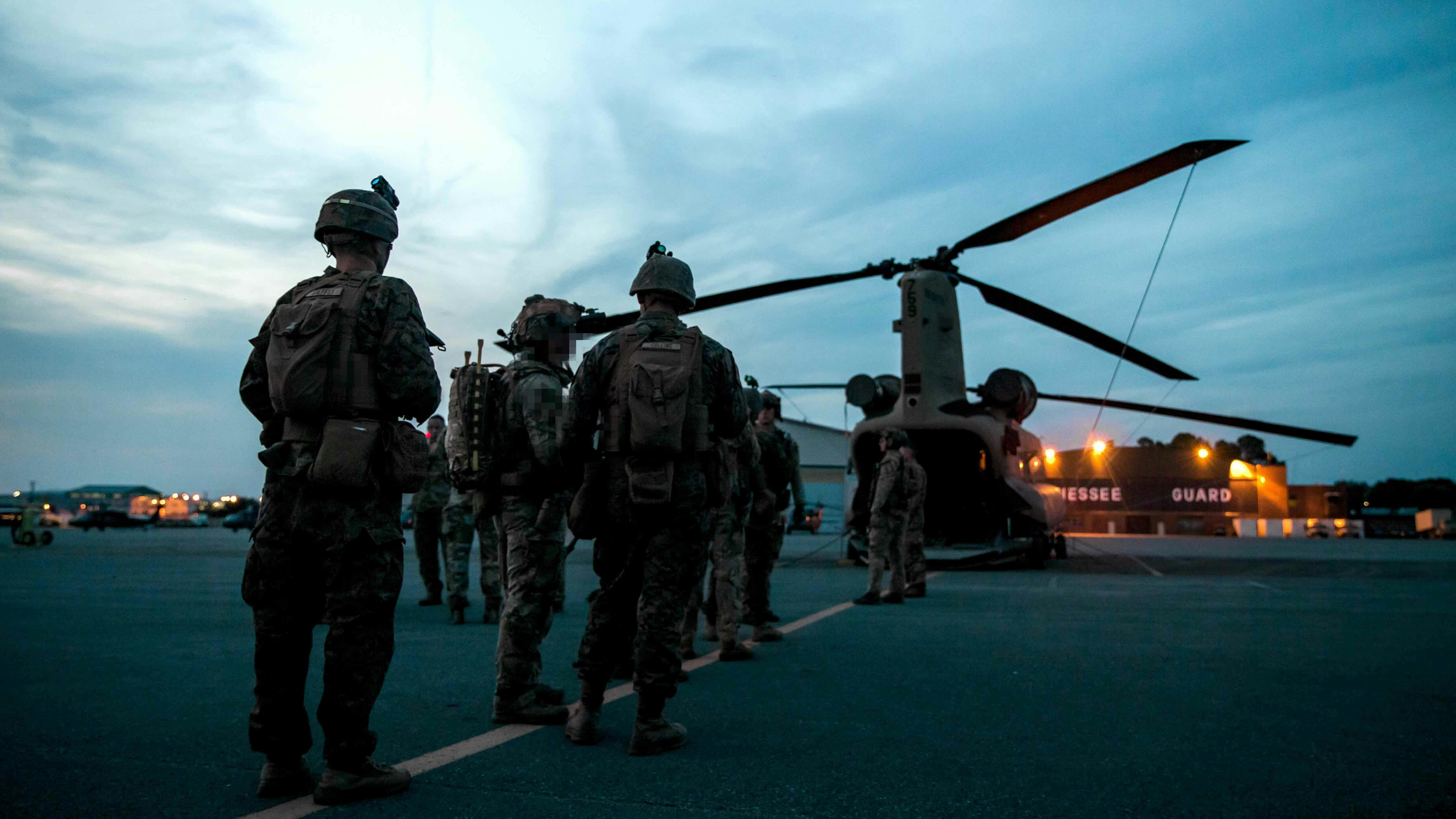 U.S. Marines with 3rd Battalion, 2d Marine Regiment (3/2), 2d Marine Division, and Marine Corps Forces Special Operations Command (MARSOC), board a U.S. Army CH-47 Chinook