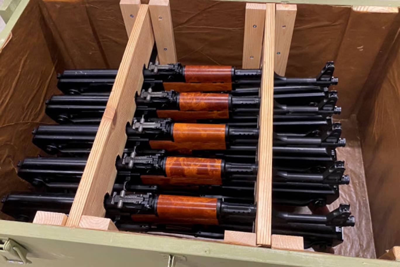 A shipment of AK-pattern rifles allegedly bound for South Sudan, released by the U.S. Department of Justice. Prosecutors say Peter Ajak and Abraham Keech conspired to export the weapons as part of a plot to overthrow the Sudanese government. (Photo: Depar
