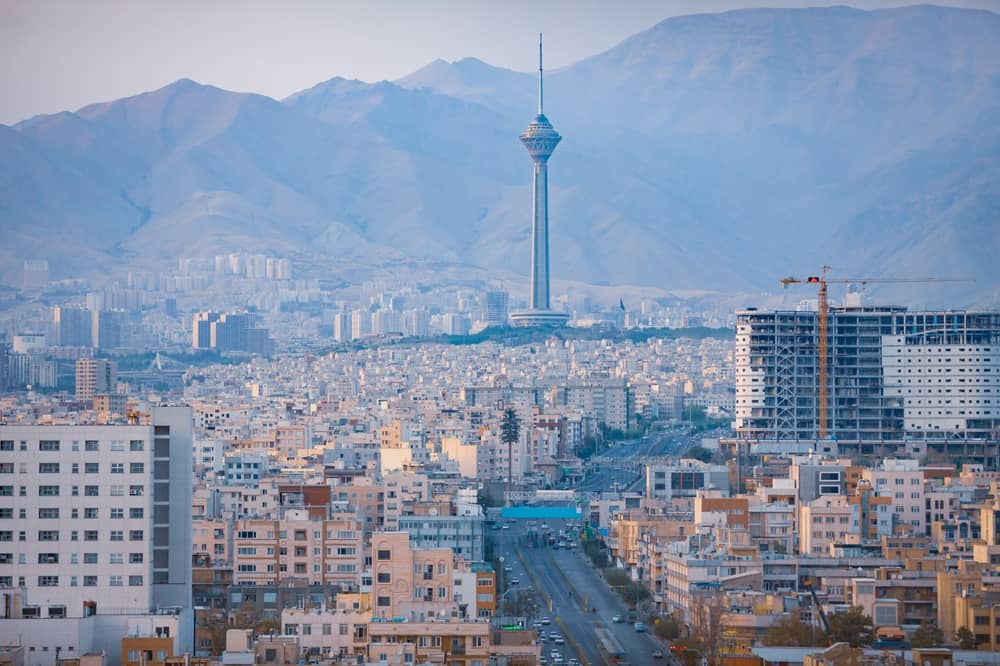 The Tehran skyline with Milad Tower. (Contentino / Shutterstock.com)