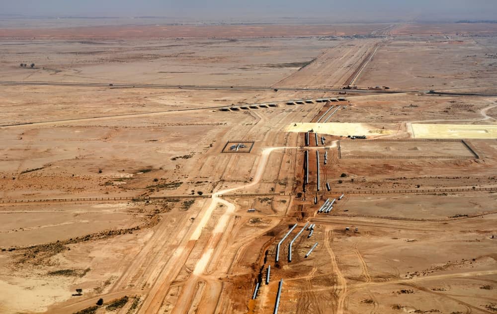 Aerial view of a major pipeline installation and infrastructure project across the arid desert landscape outside Riyadh (credit: Leonid Andronov / Shutterstock.com)