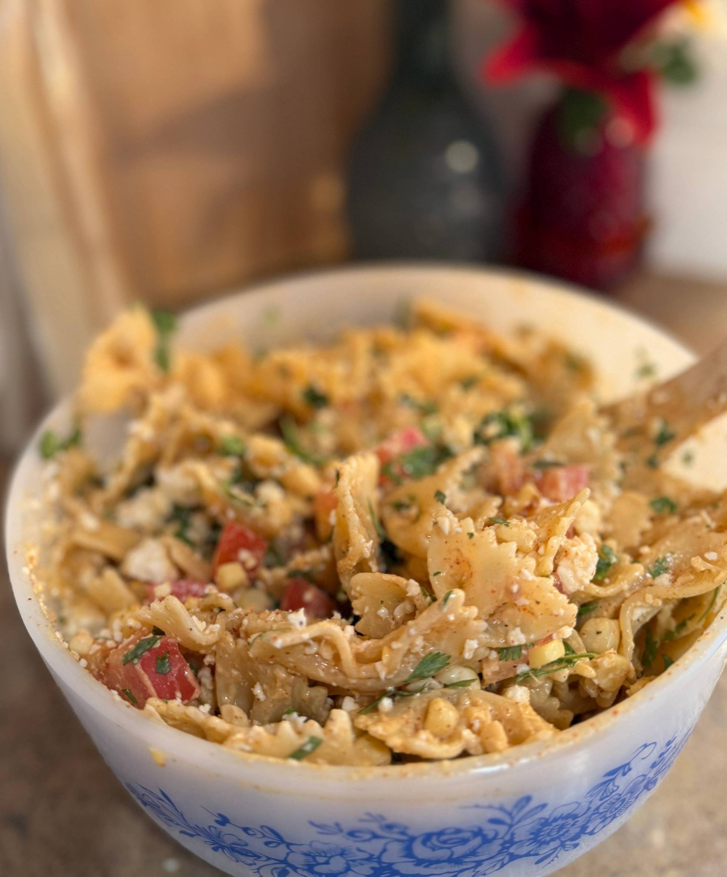 Mexican street corn pasta salad in bowl 