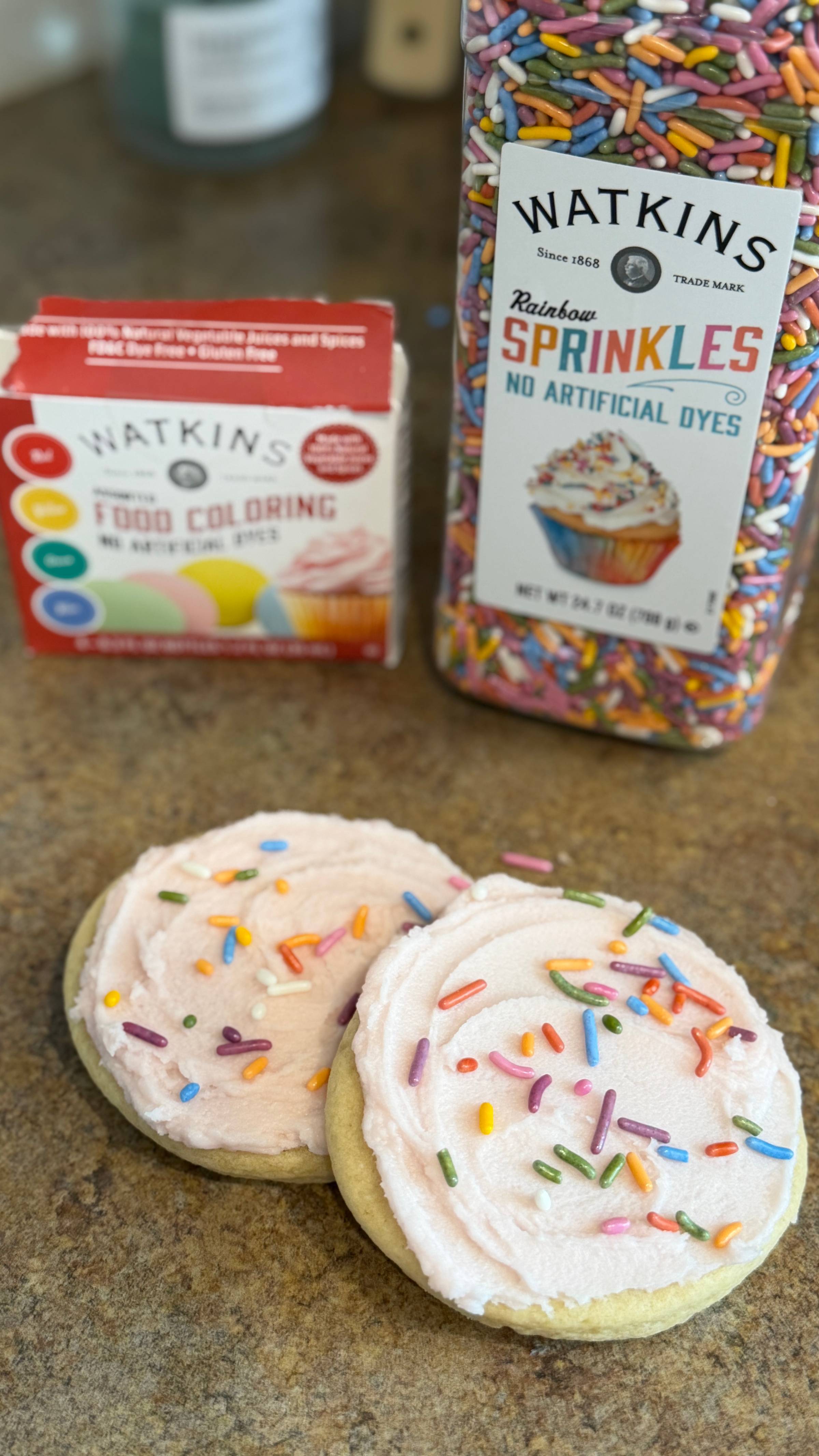 frosted sugar cookies with sprinkles