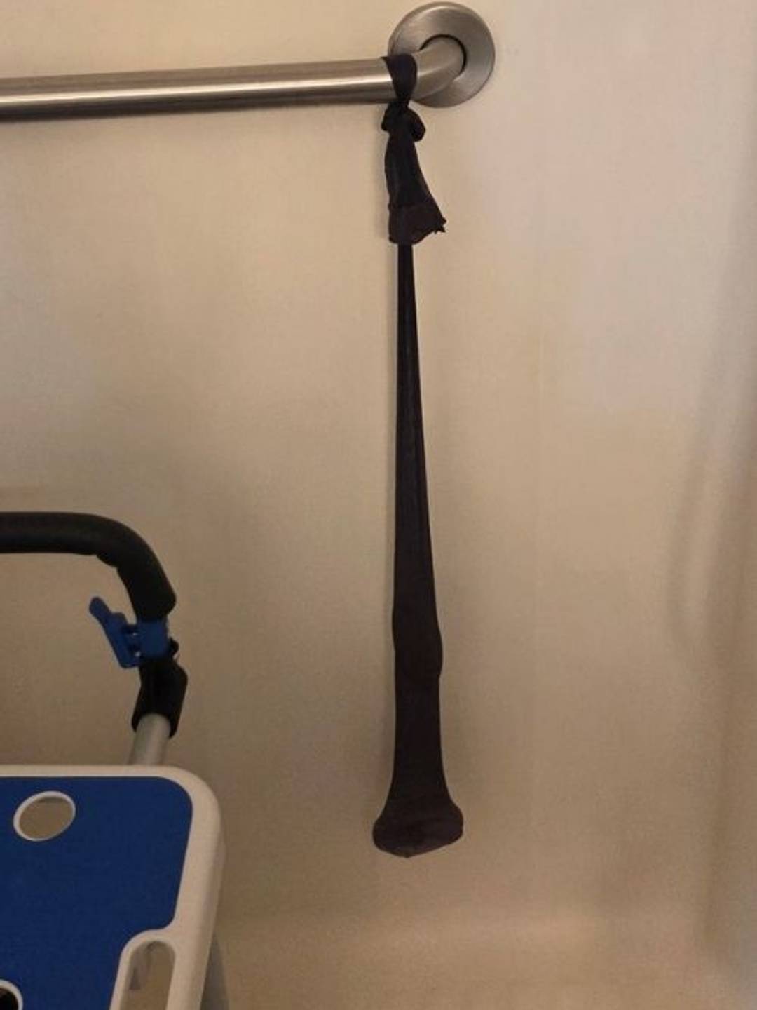 A bar of soap inside a trimmed pair of pantyhose to keep the soap from falling.