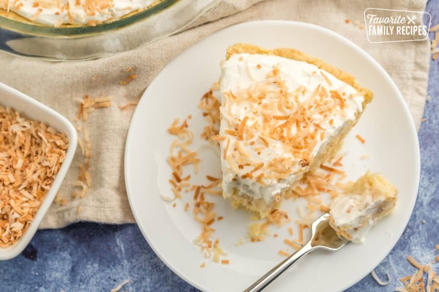 Slice of coconut cream pie on a plate