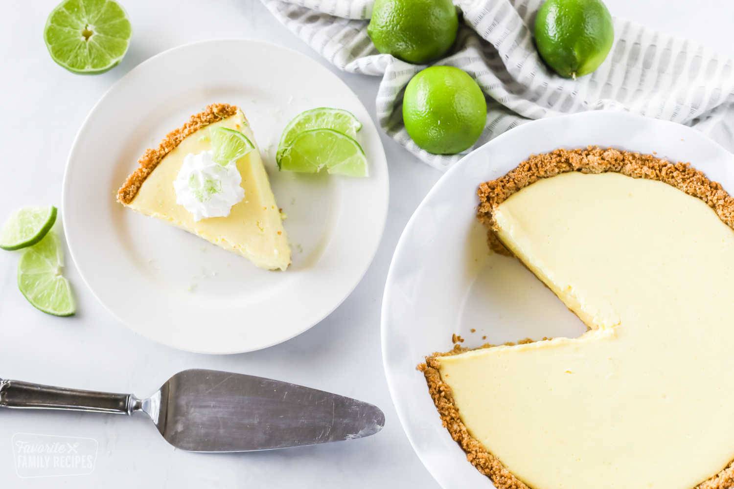 Key lime pie with a slice cut out on the side