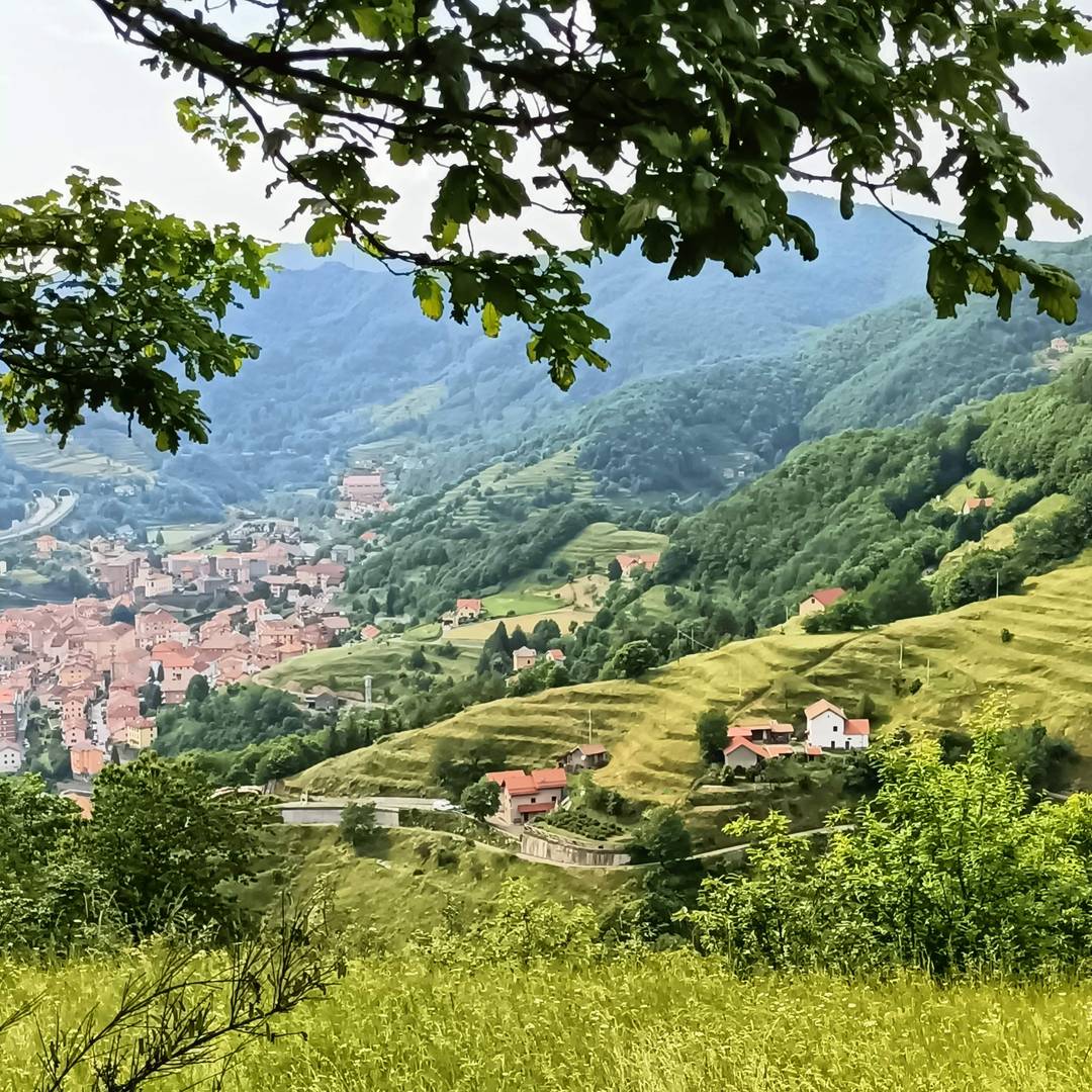 view of village with terraced hills