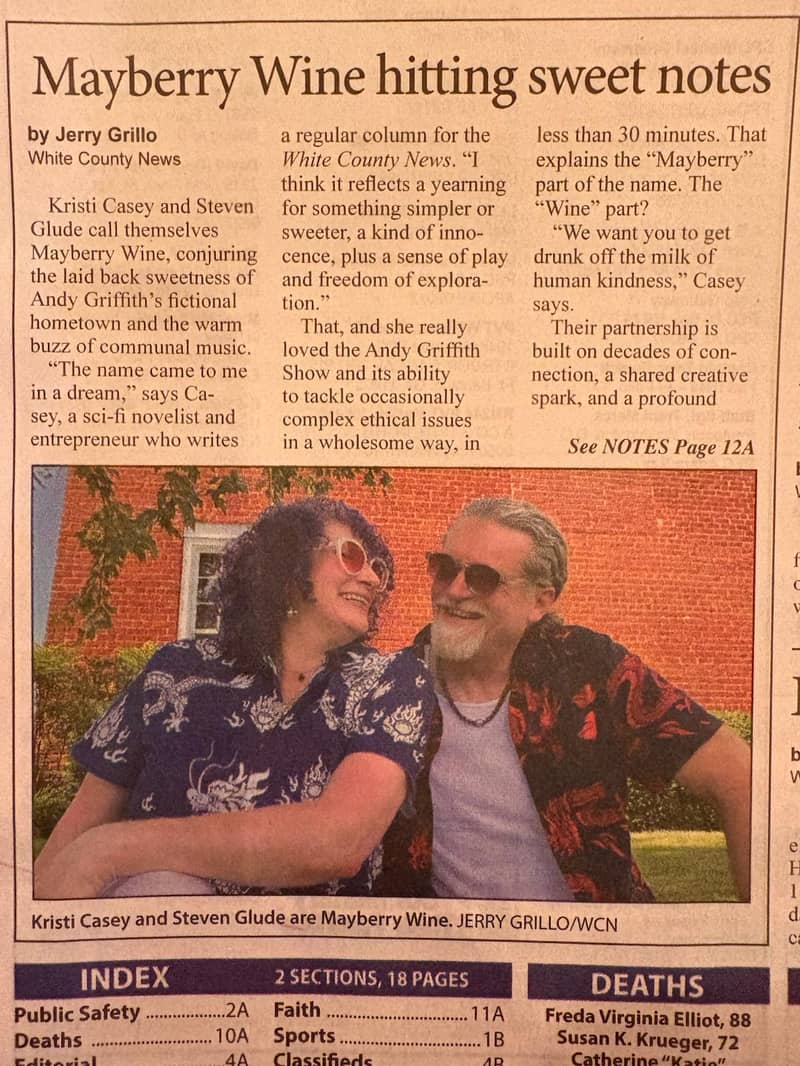 newspaper article about Mayberry wine, there are two pages of the newspaper article included