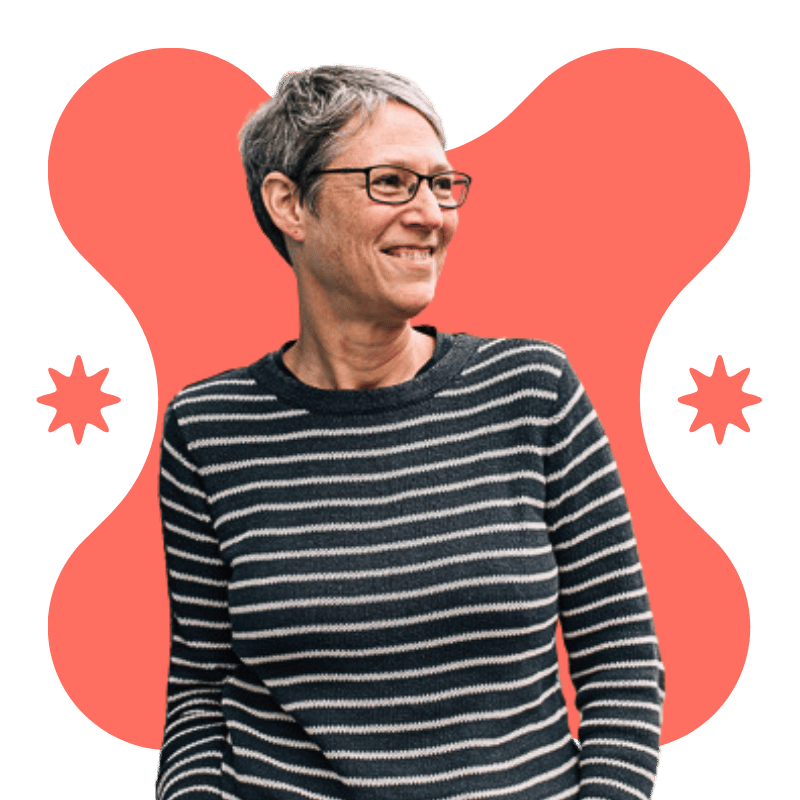 Denise's photo: a white female with glasses and horizontally striped long-sleeve Tshirt,, looks towards the right with a smile. 