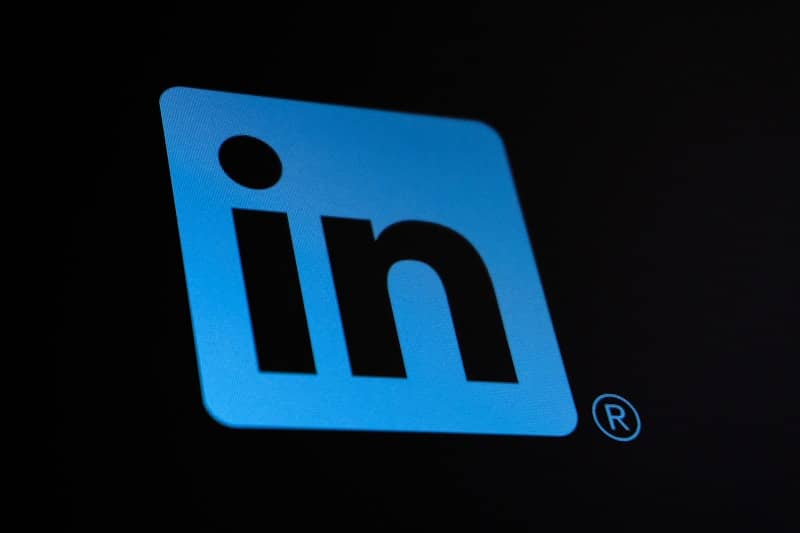 The linkedin logo on a dark background