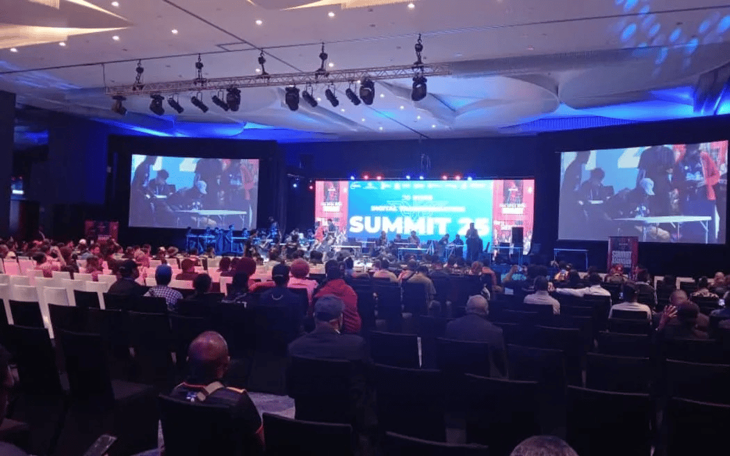 Nearly 1,100 participants at PNG Digital Transformation Summit 2025 in Port Moresby discuss SevisPass digital ID rollout and government digitization policies.