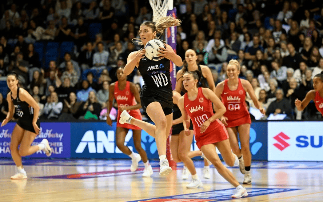 New Zealand netball team concludes 12-Test season with Manchester victory despite coaching uncertainties and team illness.