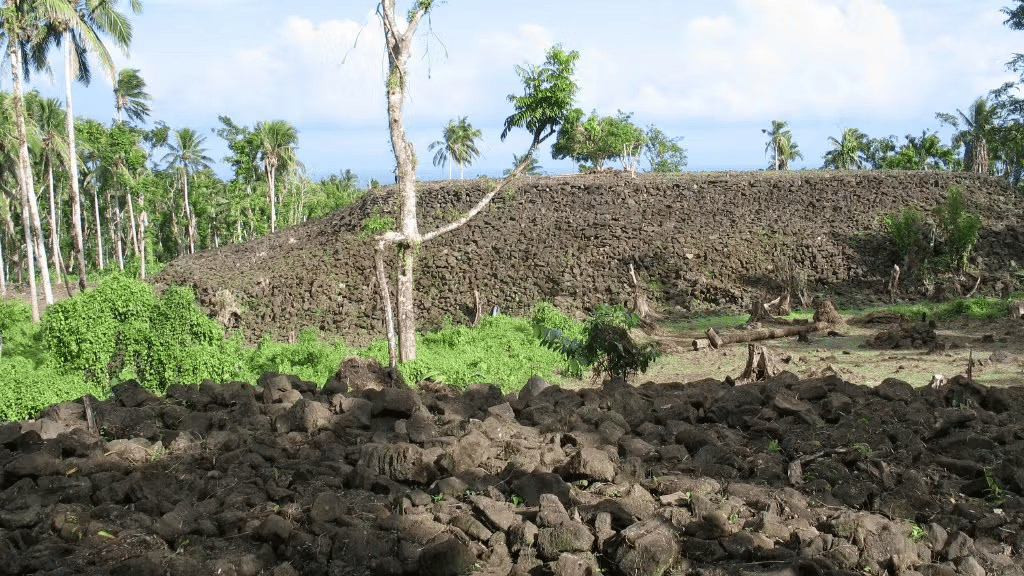 The Pulemelei Mound, the largest and oldest ancient stone structure in Polynesia, stands 12 meters high and spans 65 by 60 meters on Savai’i island, Samoa. This enigmatic pyramid-shaped monument, built between 1100 and 1400 AD, remains a significant cultural and archaeological landmark offering panoramic views of the surrounding landscape.