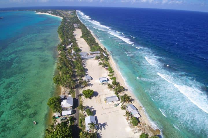The first residents of Tuvalu have begun relocating under a bilateral visa program as rising seas threaten their Pacific homeland.