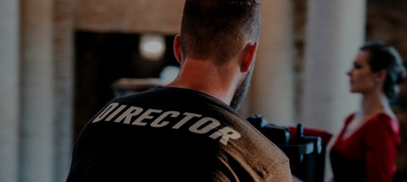 Film director filming a scene 