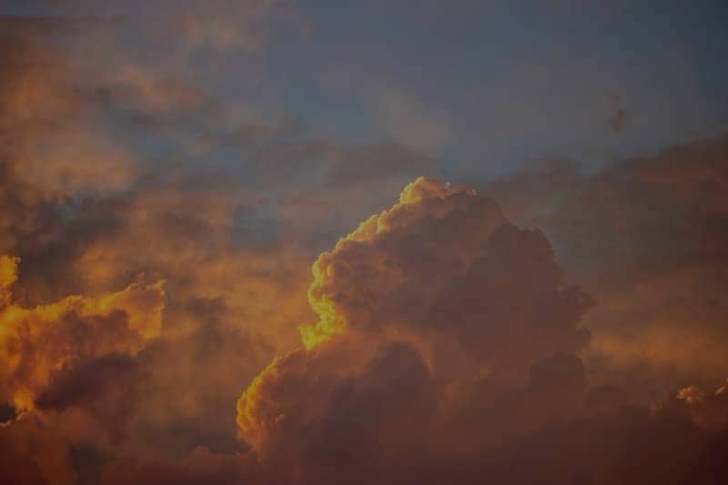 A Sky Of Sun Dappled Clouds
