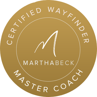 Golden circle with the words "Certified Wayfinder" written on a curve at the top, "Master Coach" written on a curve at the bottom, and "Marthabeck" written in the middle with a M above it.