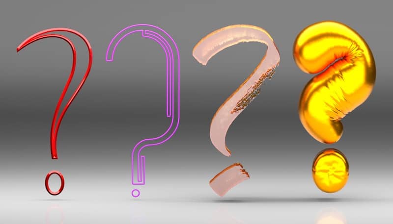 A number of different shapes and sizes of question marks.