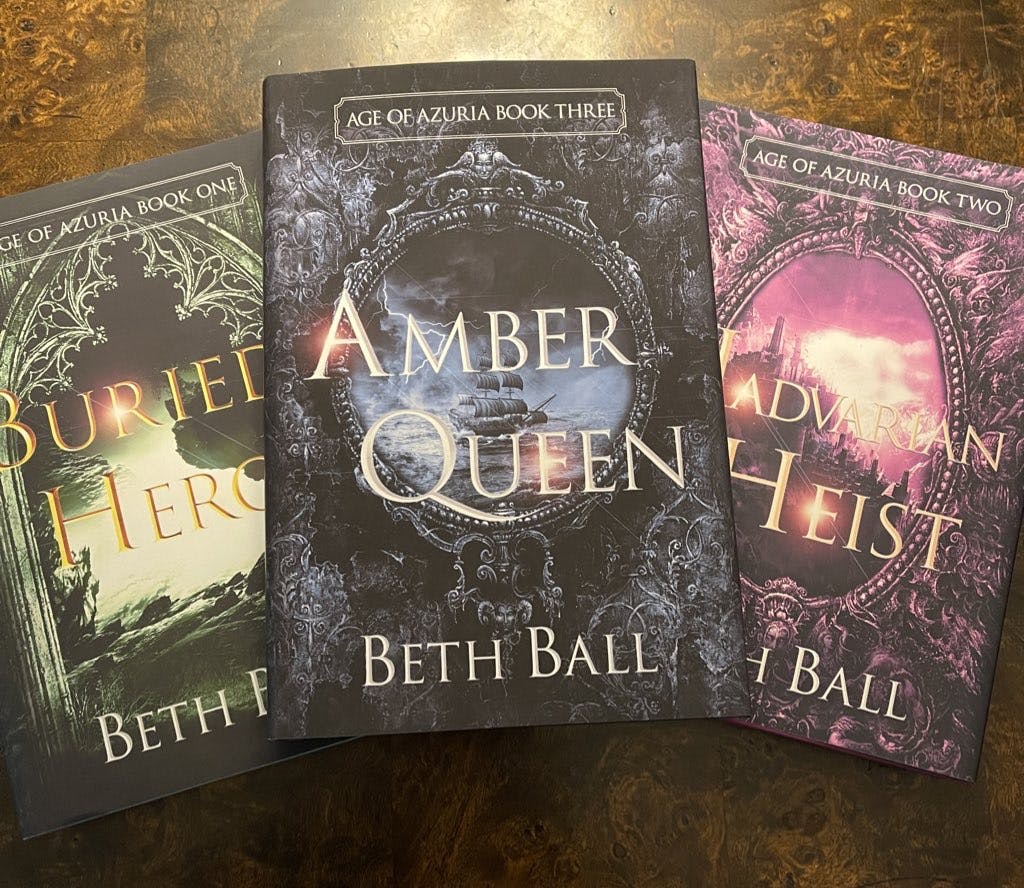 picture of three fantasy novels from the Age of Azuria series by Beth Ball