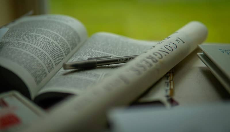 Open book, pen, and