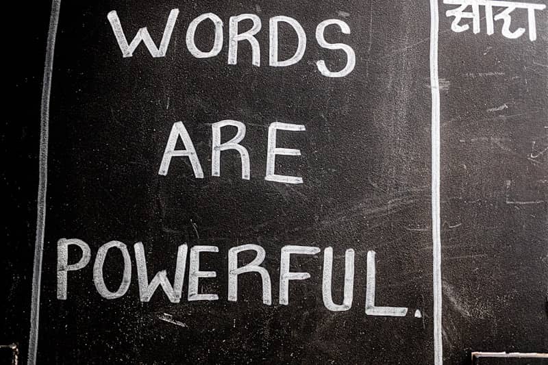 Words are powerful written on a blackboard.