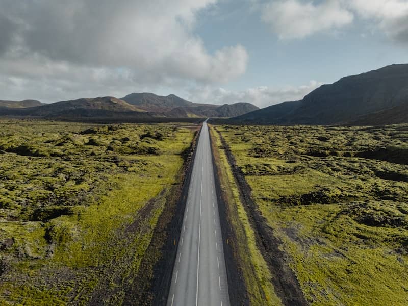 An aerial view of a road in the middle of nowhere