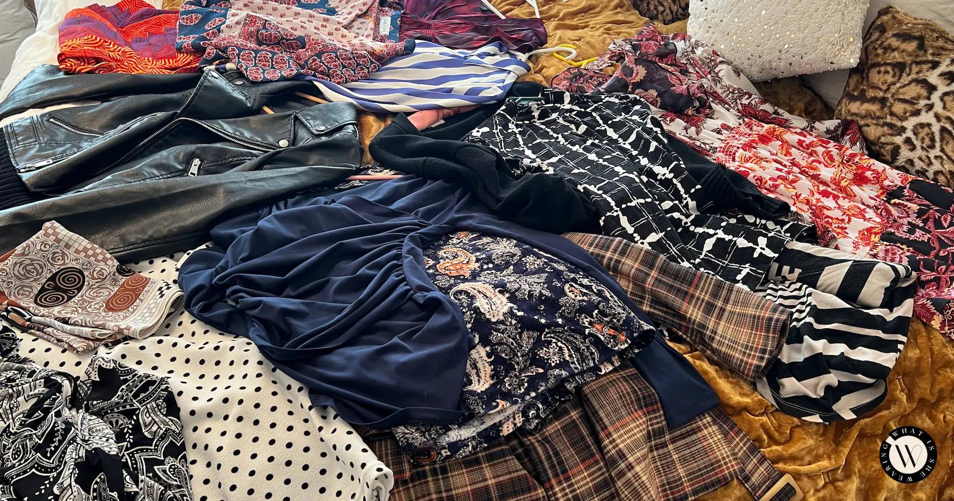 Mixed patterns outfits on a bed