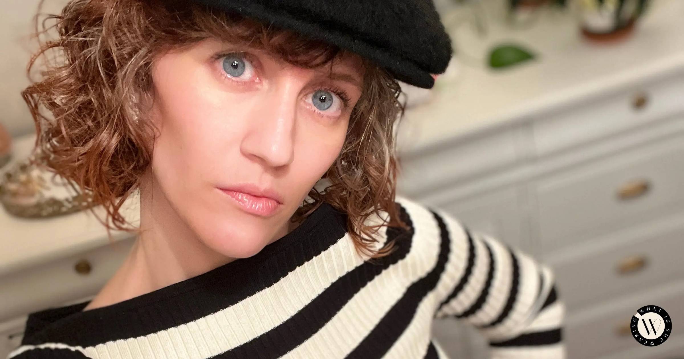 Woman deciding she'll never make these fashion mistakes again.