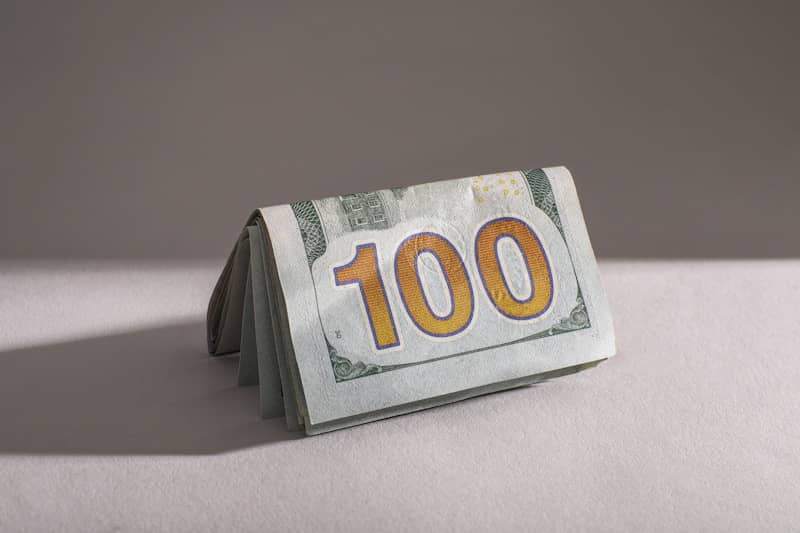 A stack of one hundred dollar bills