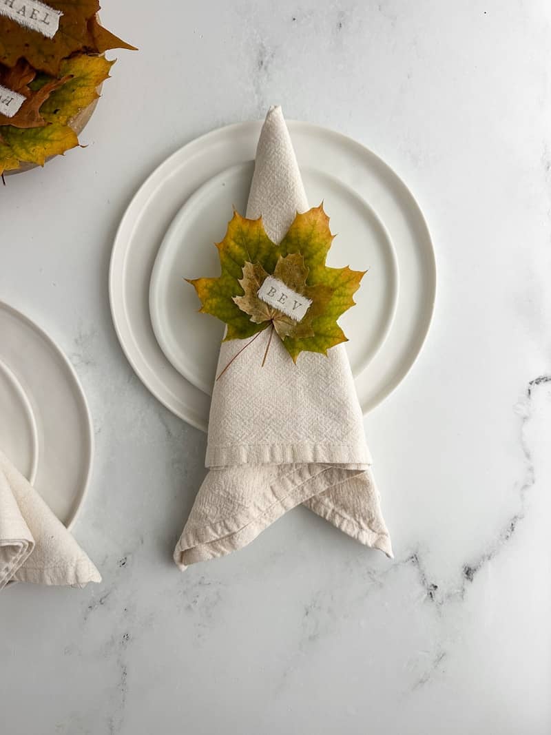 Autumn table setting with leaf napkin rings.
