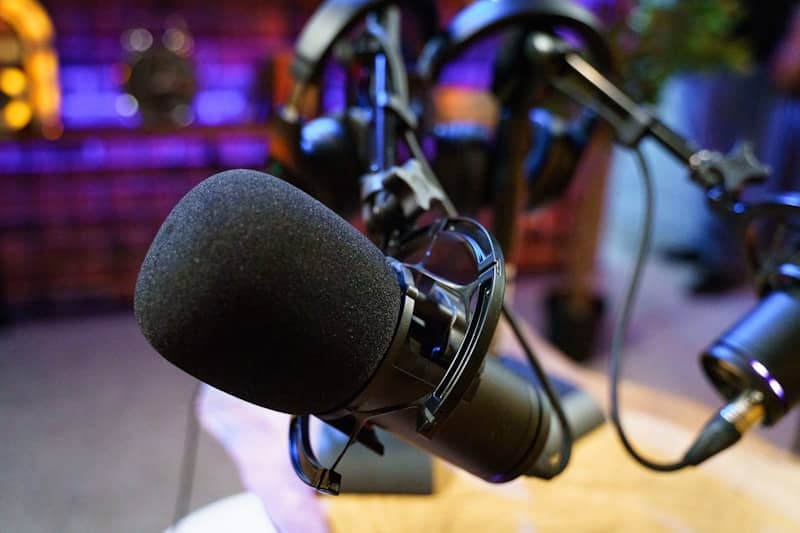 black and silver microphone on black steel stand