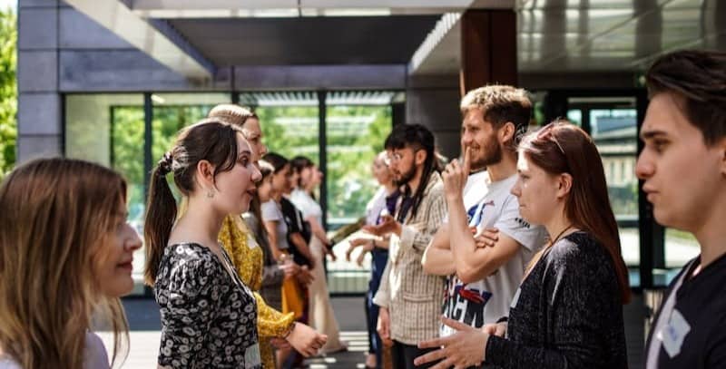 a group of people standing outside