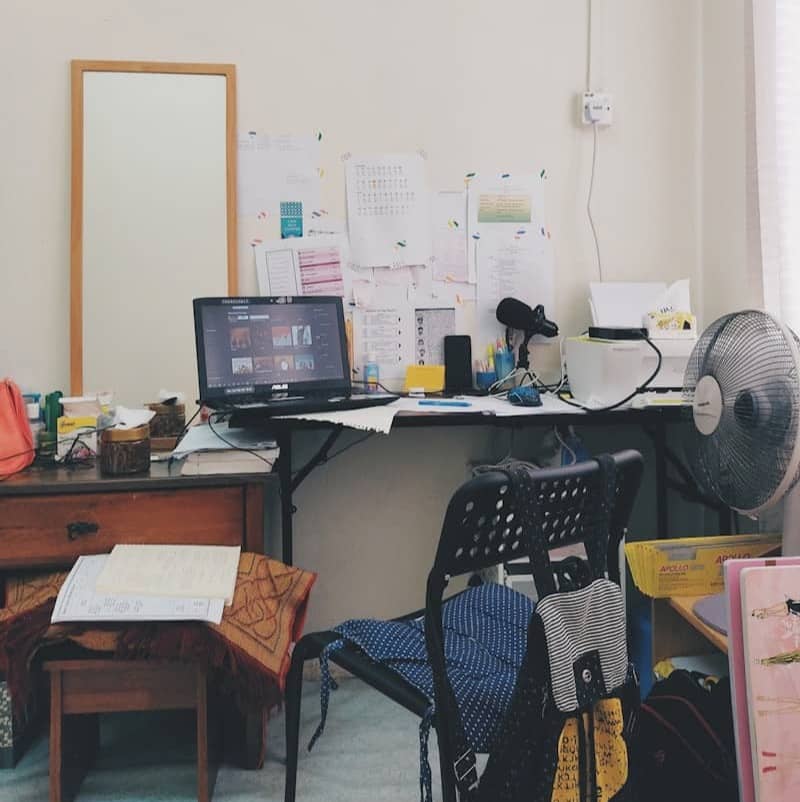 black flat screen computer monitor on brown wooden desk