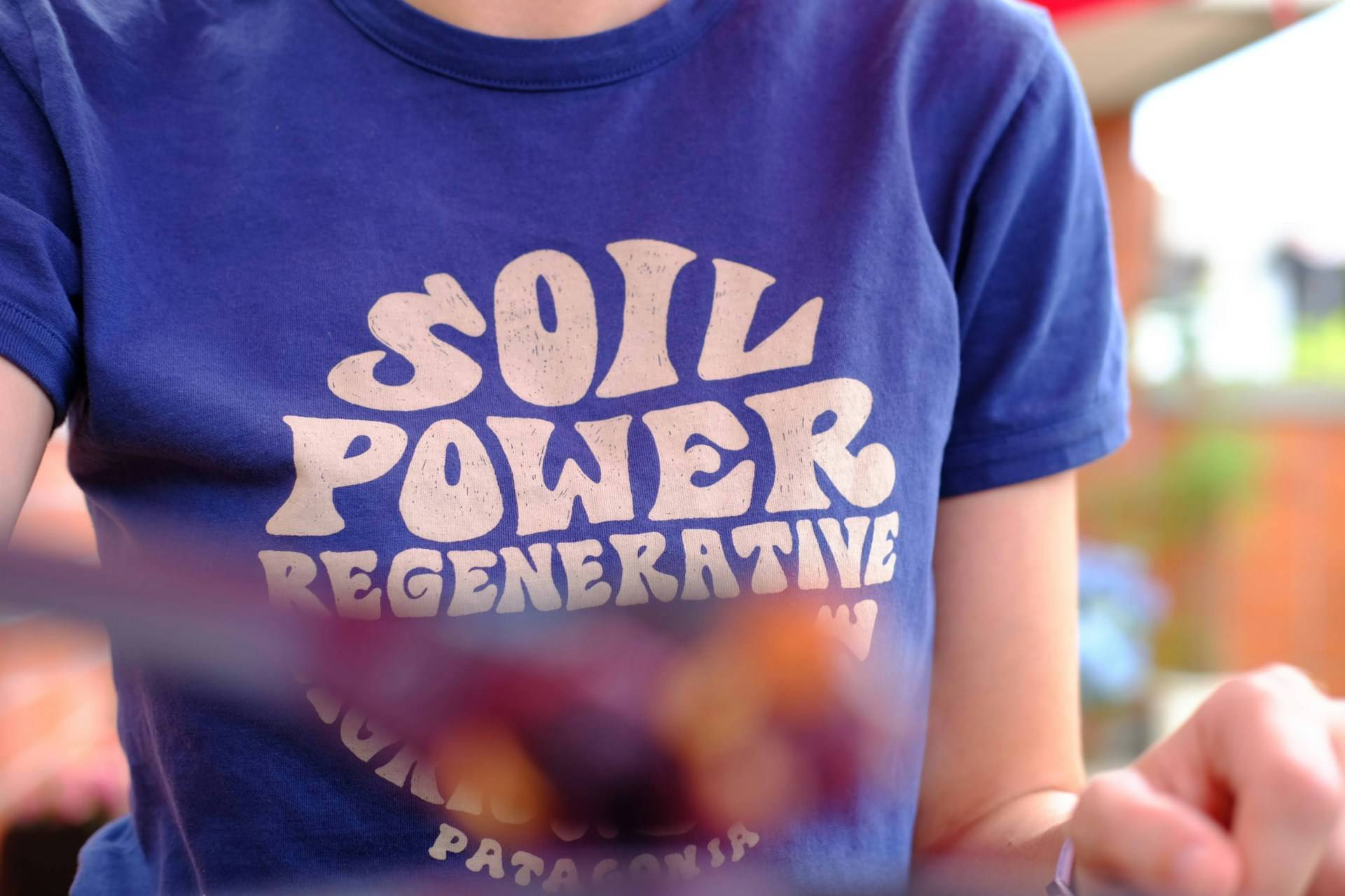 patagonia shirt reads soil power regenerative