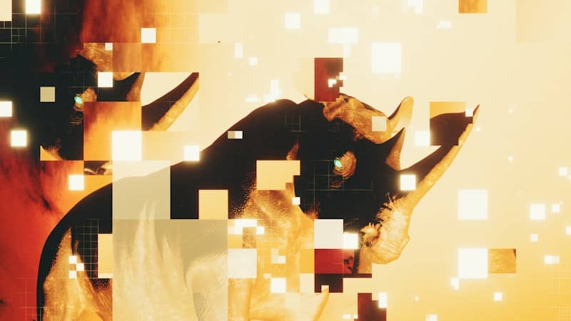A rhinoceros silhouette overlaid with glowing yellow digital squares on a warm background