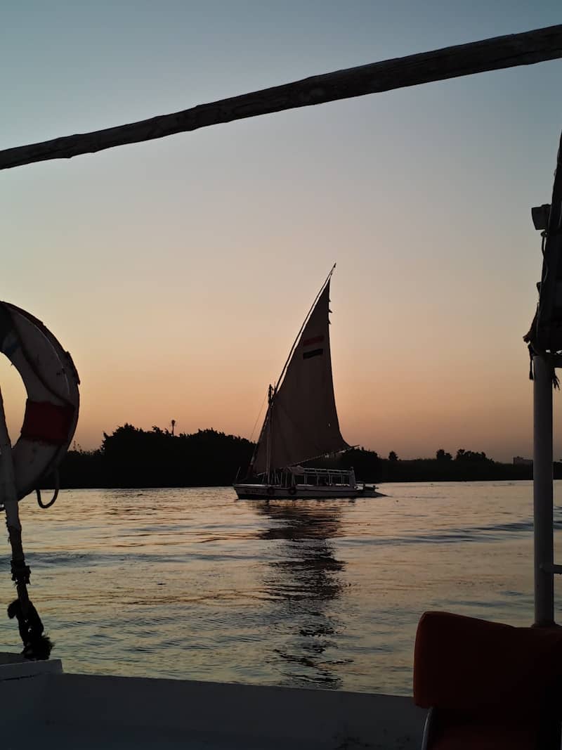 Sailboat on the nile river at sunset