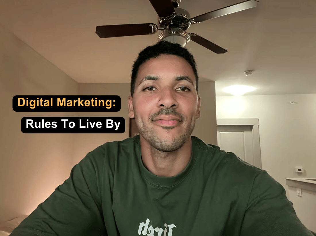 Kaelan Moss at his desk with the words "Digital Marketing: Rules to live by"