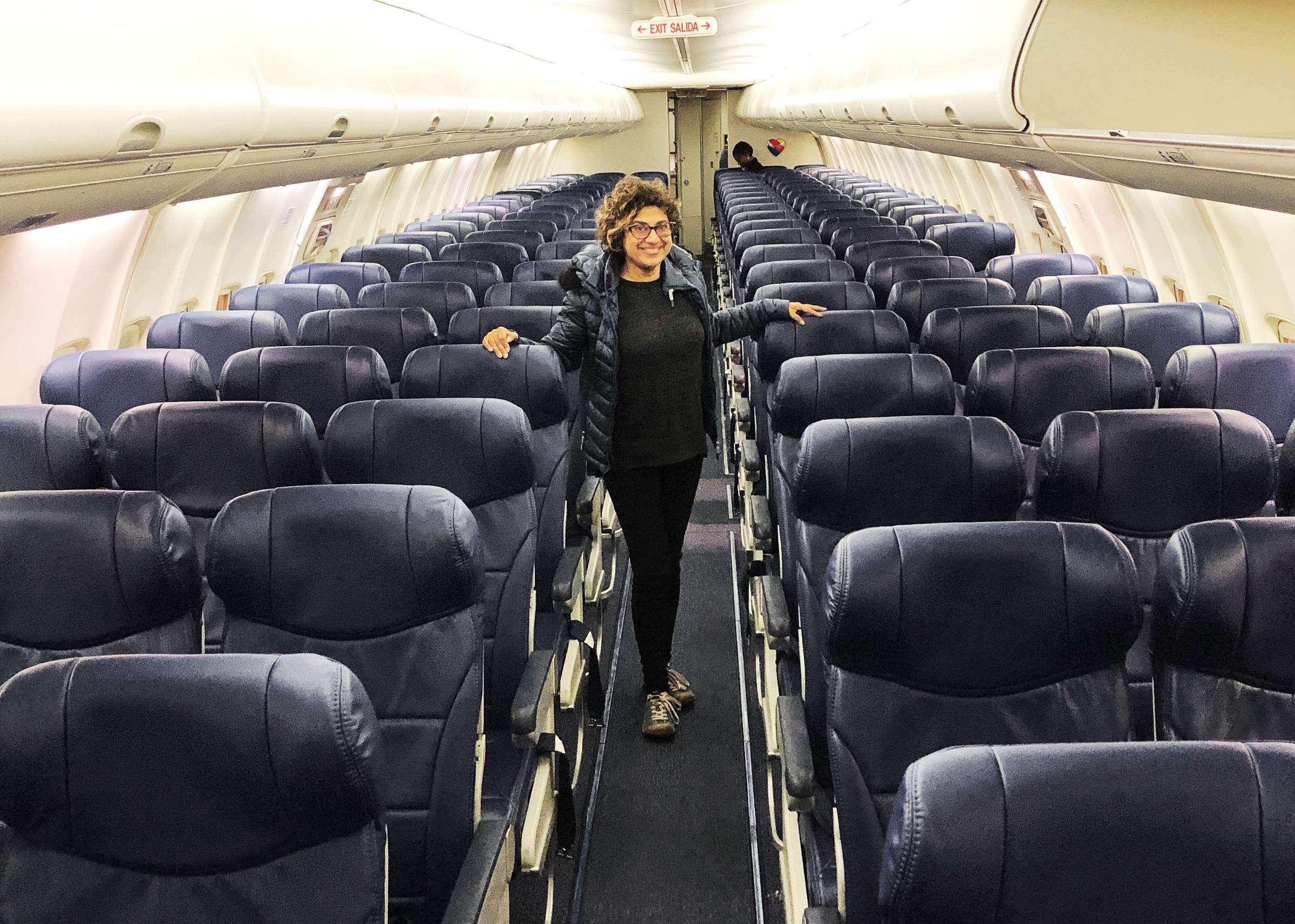 Alpana on empty plane at the start of the pandemic