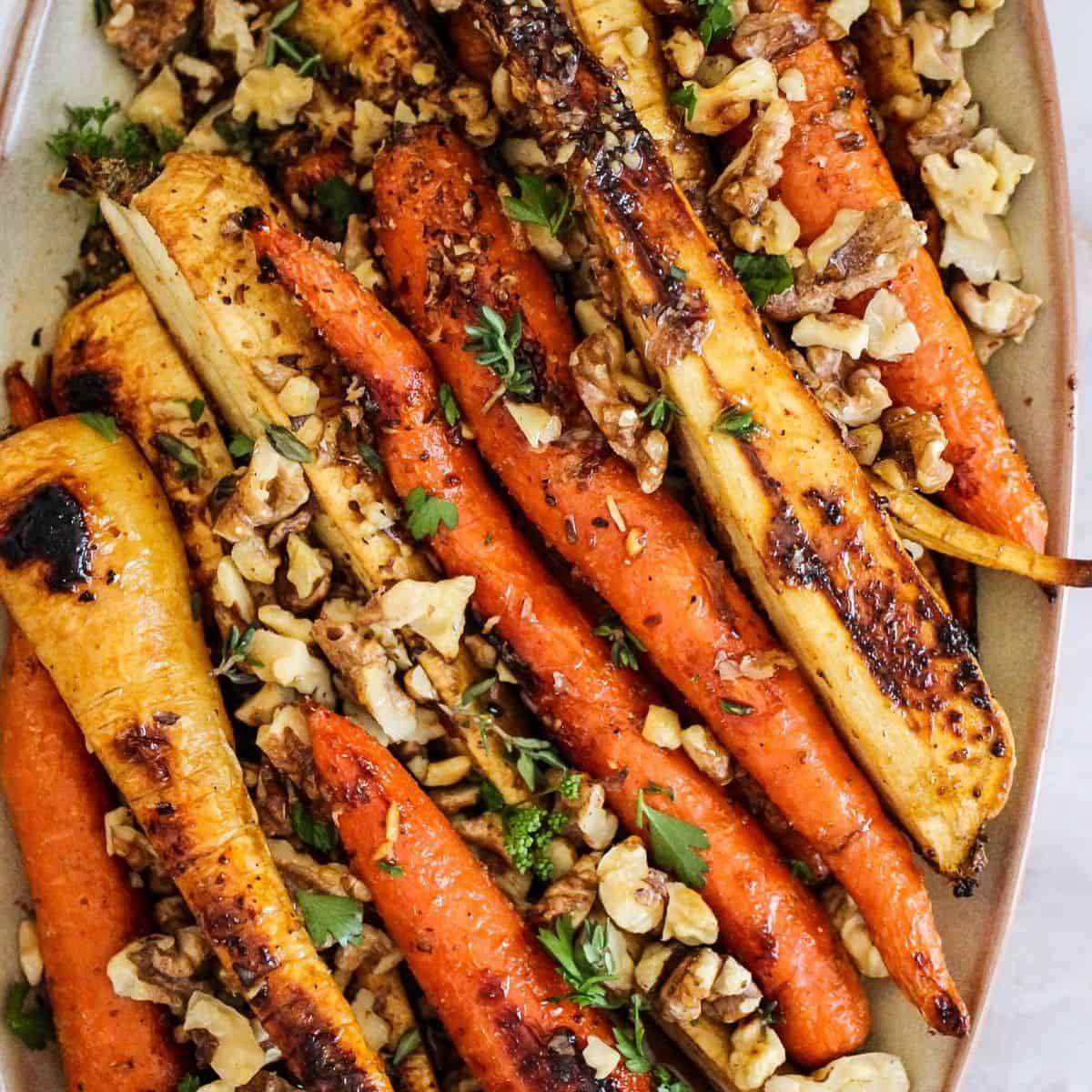 Honey roasted carrots and parsnips with walnuts.