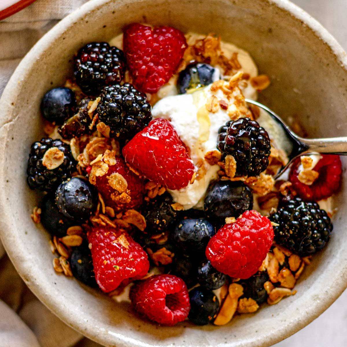 Greek yogurt with berries and granola.